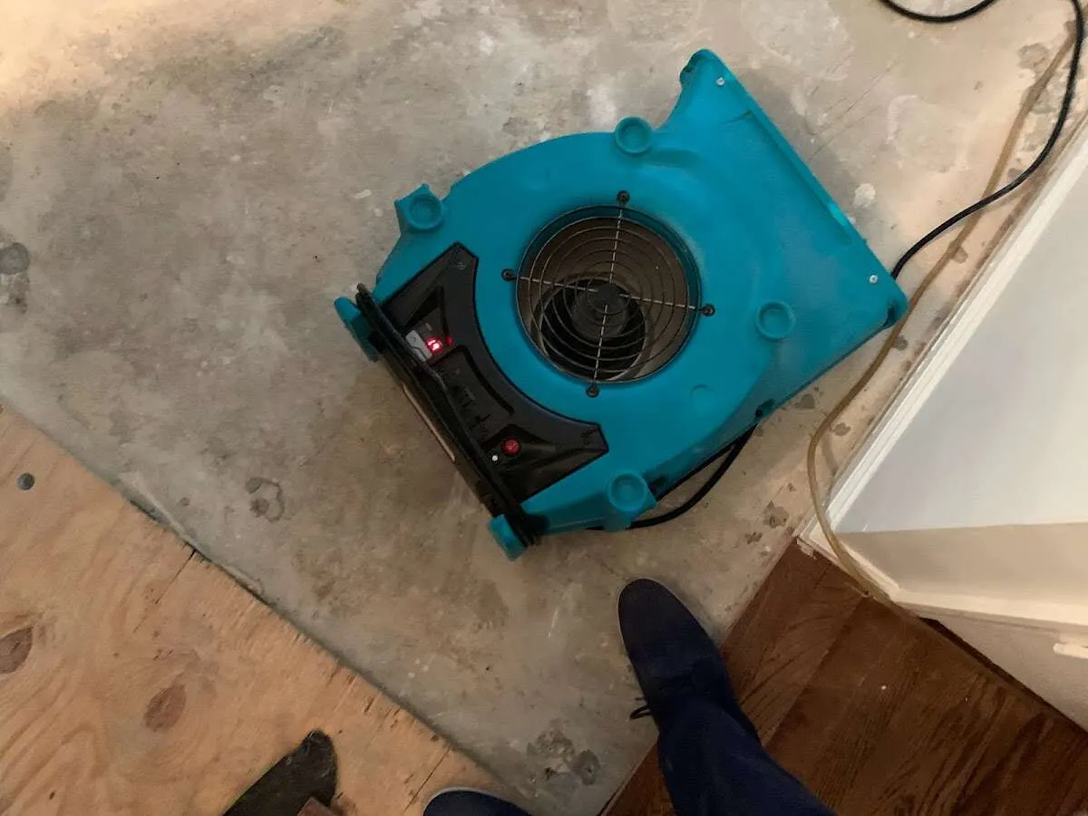 Air mover drying subfloor during Commercial Water Damage Restoration in Boyes Hot Springs